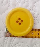 bouton clown jaune